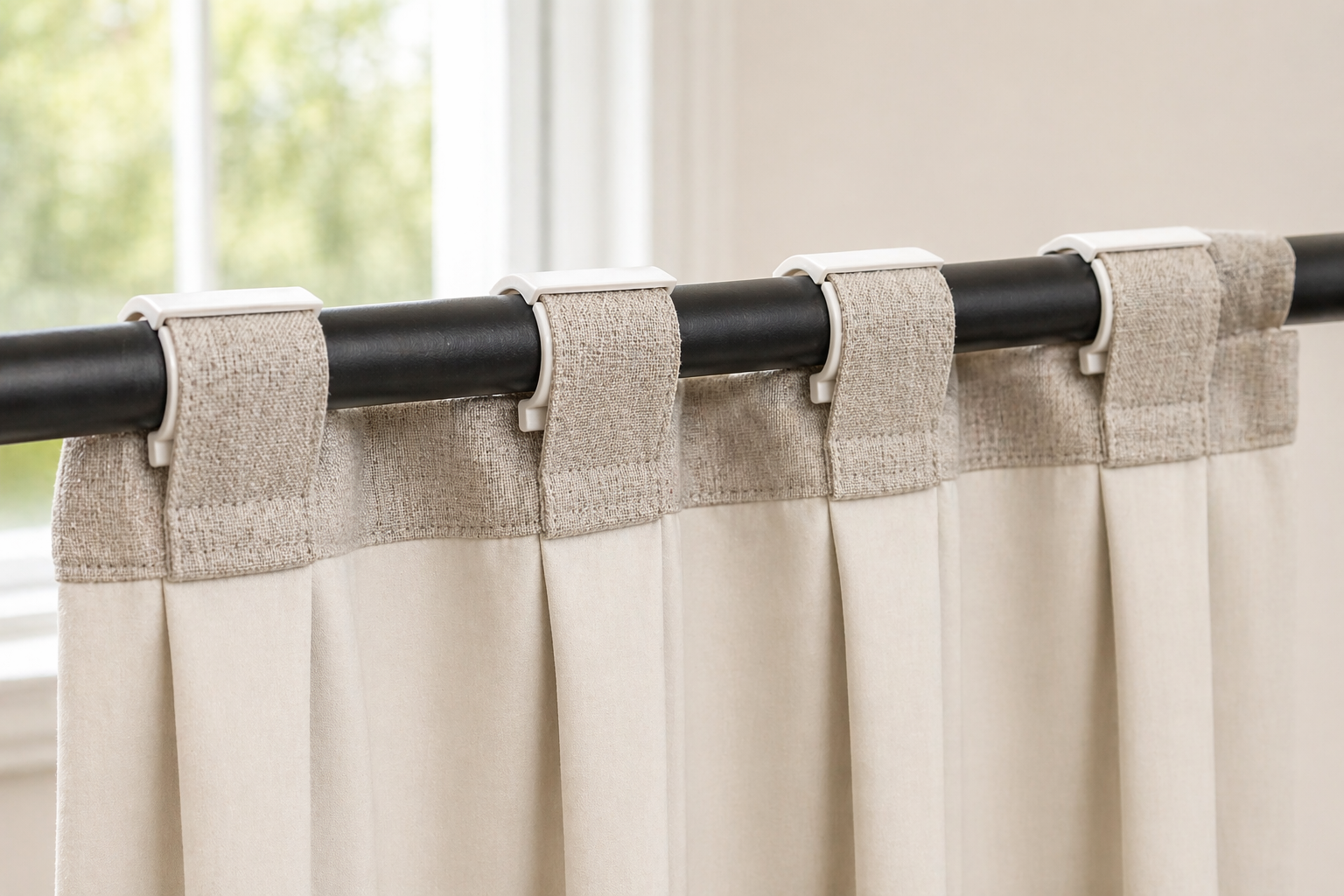 Close-up of curtain back tabs on SilkSlide clips